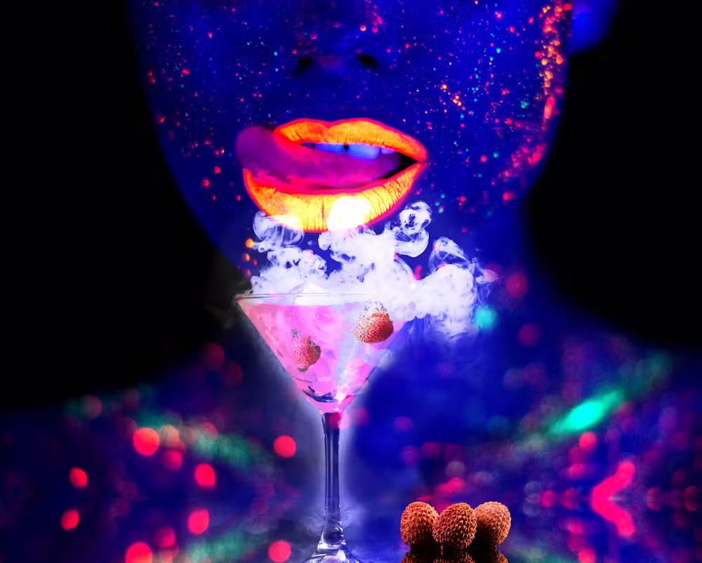 Freaky lychee martini under neon light at Oceanos