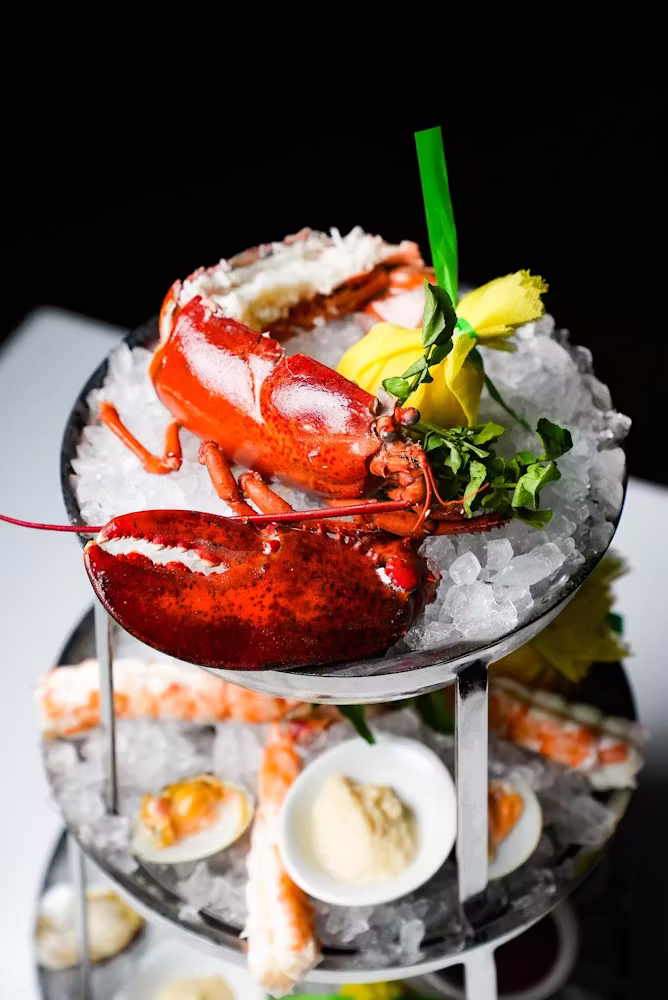 The Oceanos Seafood Tower, oysters, colossal shrimp, little neck clams and half a lobster